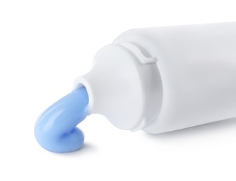 Photo of Tube with toothpaste on white background. Dental care