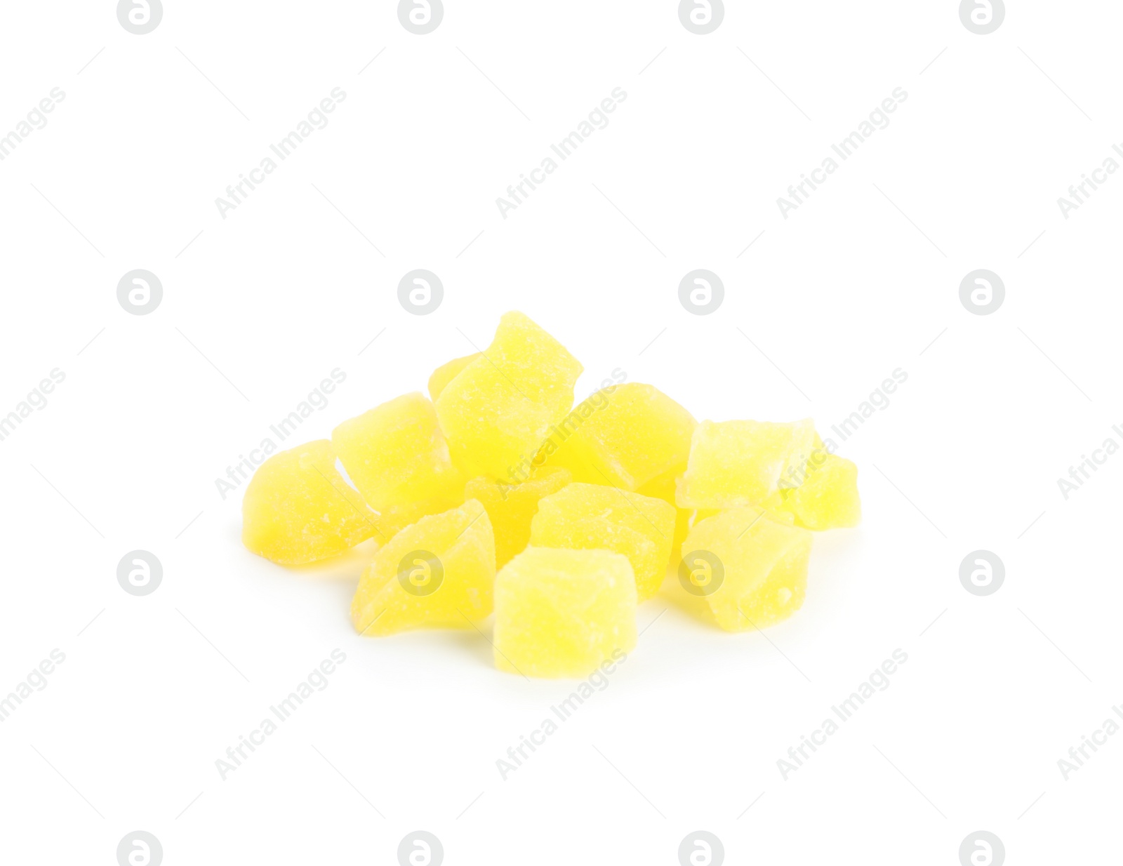 Photo of Delicious yellow candied fruit pieces on white background