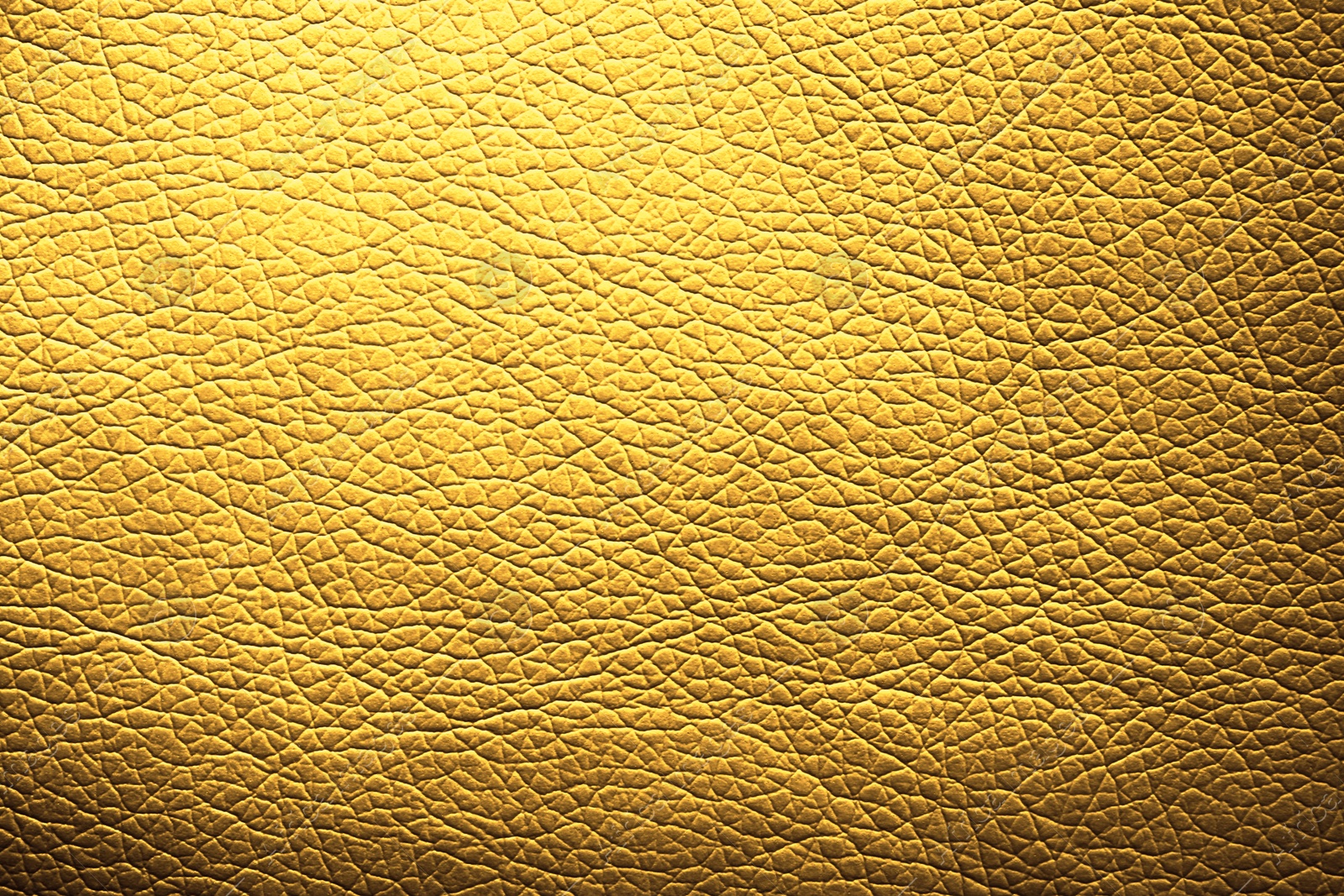 Image of Golden textured surface as background, closeup view