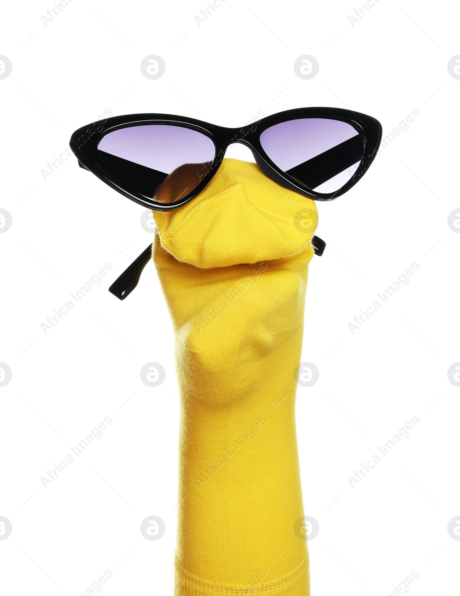 Photo of Funny sock puppet with sunglasses isolated on white