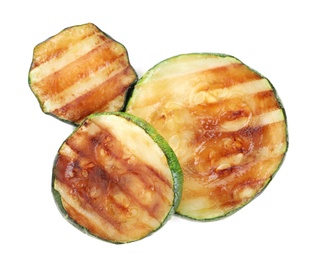 Photo of Delicious grilled zucchini slices on white background, top view