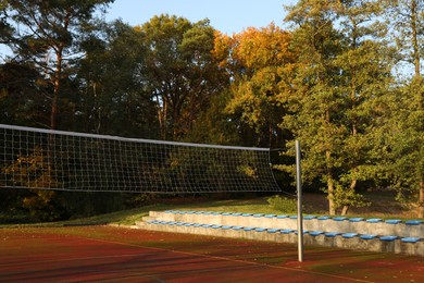 Photo of View of volleyball court with net outdoors