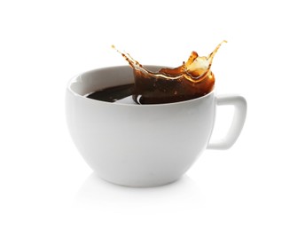 Coffee splashing out of cup on white background