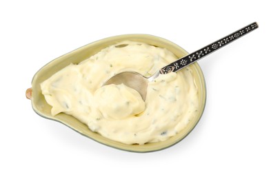 Photo of Tartar sauce and spoon in gravy boat isolated on white, top view