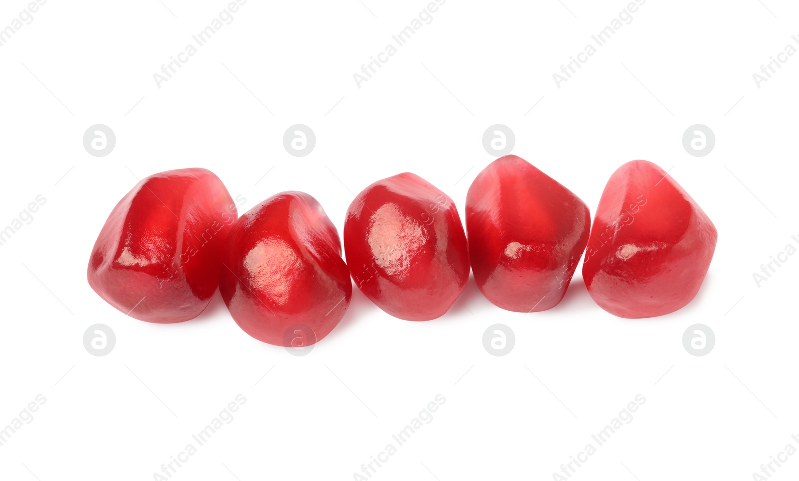 Photo of Juicy red pomegranate seeds on white background