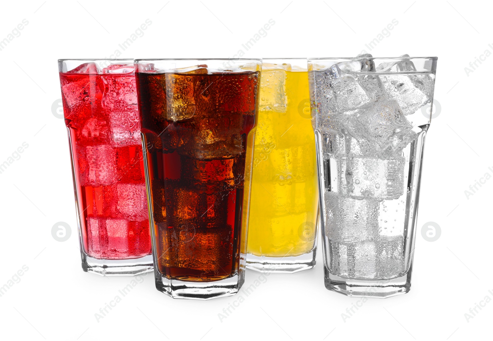 Photo of Glasses of different refreshing soda water with ice cubes isolated on white