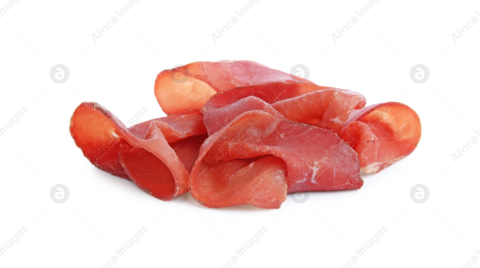 Photo of Slices of tasty bresaola isolated on white