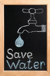 Photo of Blackboard with words Save Water and drawn tap, closeup