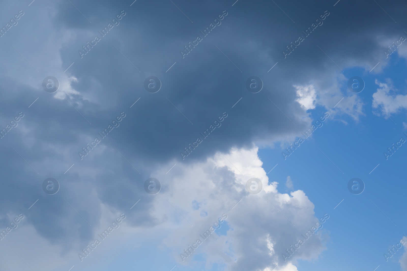 Photo of Dark gloomy clouds on sky as background