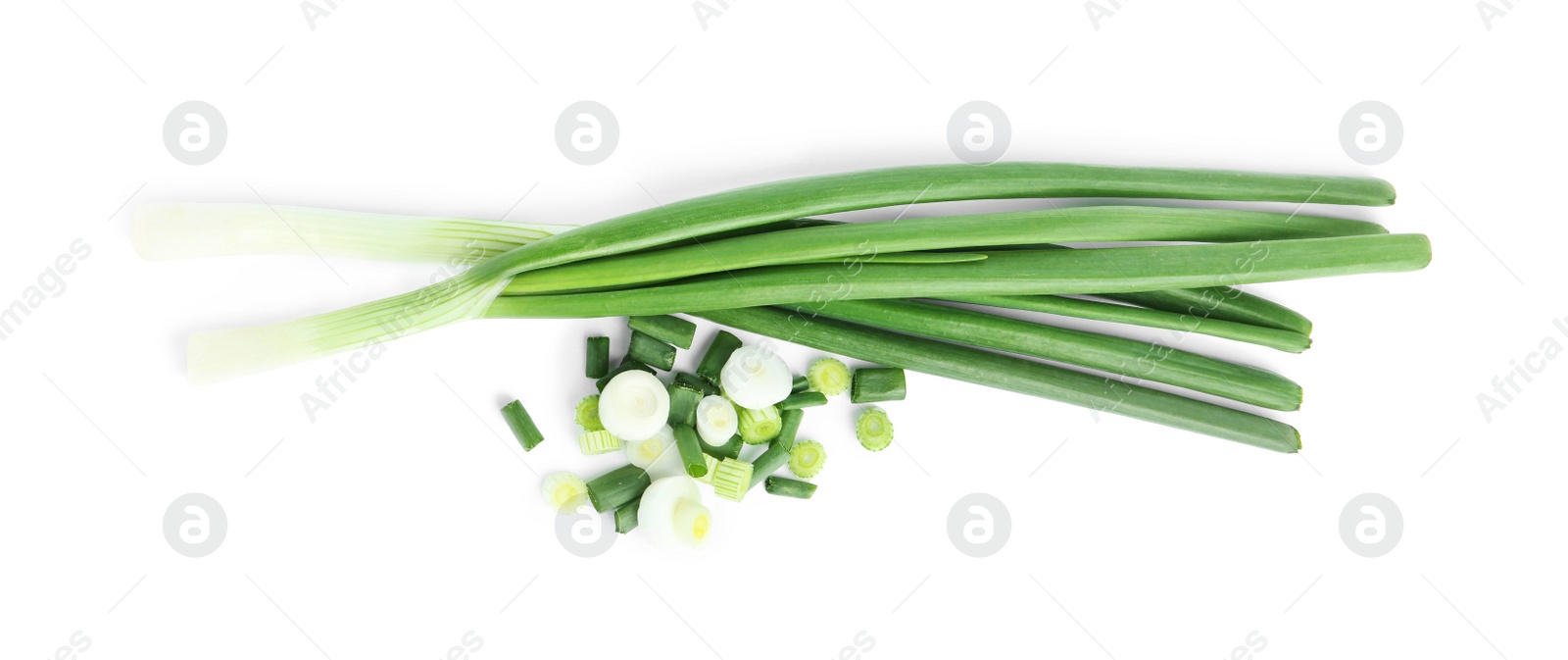 Photo of Fresh green spring onions isolated on white, top view