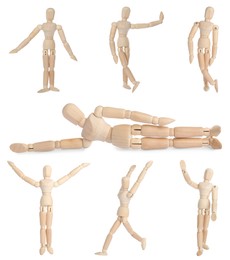Image of Set with wooden human models in different poses on white background