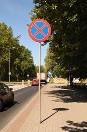 Photo of Road sign No Stopping outdoors on sunny day