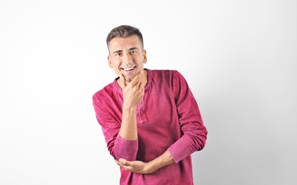 Handsome young man on white background