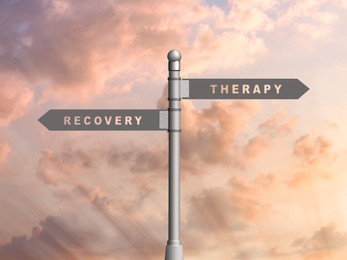 Start to live without alcohol addiction. Signpost with inscriptions THERAPY AND RECOVERY against beautiful sky