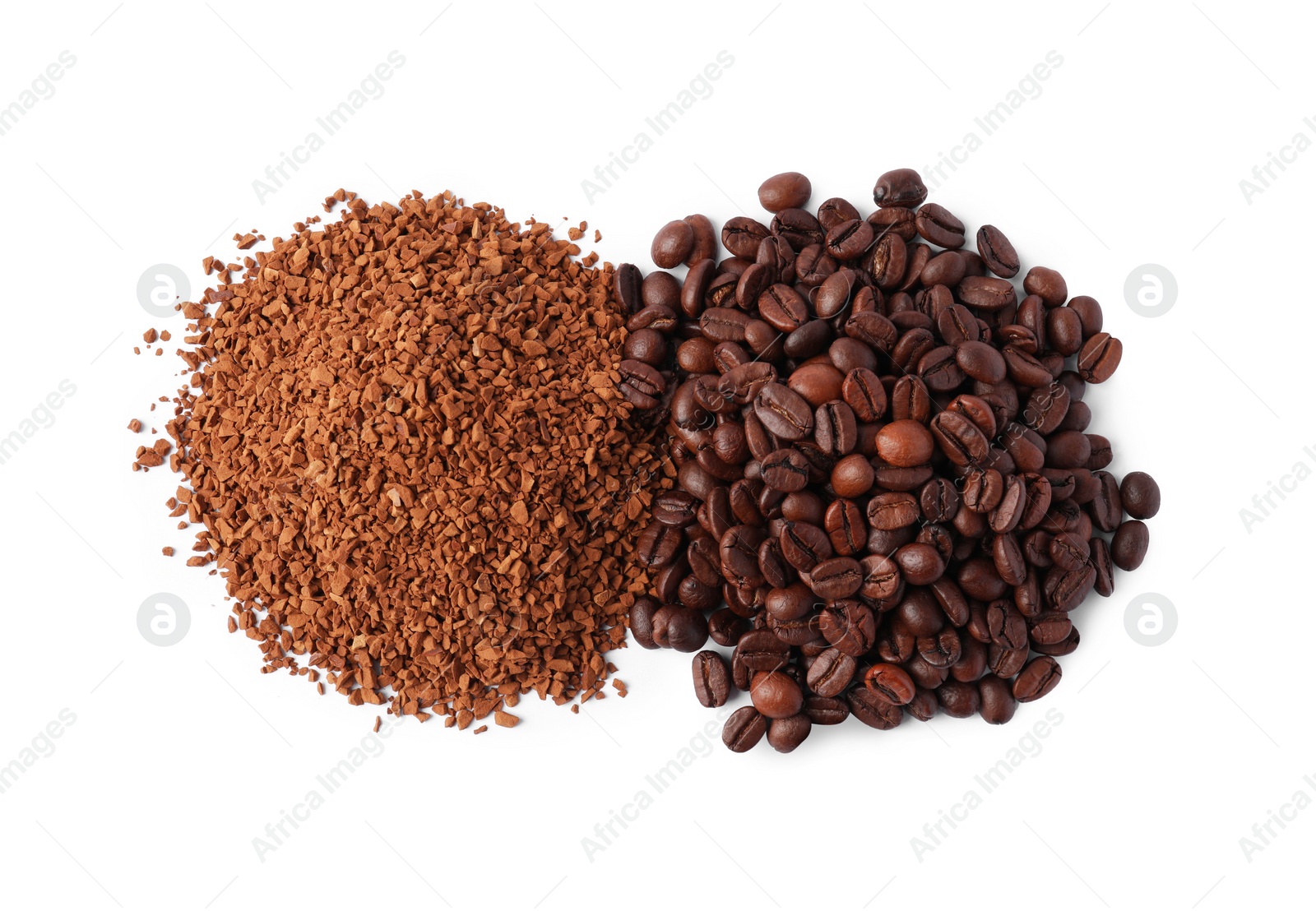 Photo of Heap of instant coffee and beans on white background, top view