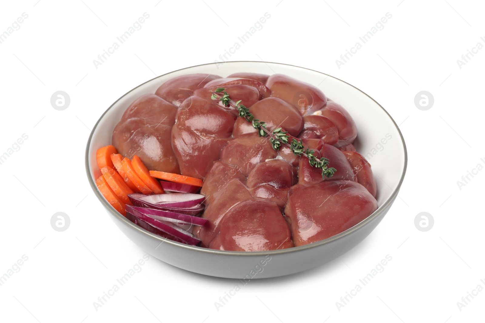 Photo of Fresh raw kidney meat with vegetables in bowl isolated on white