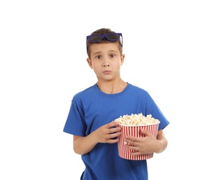 Emotional boy with 3D glasses and popcorn during cinema show on white background