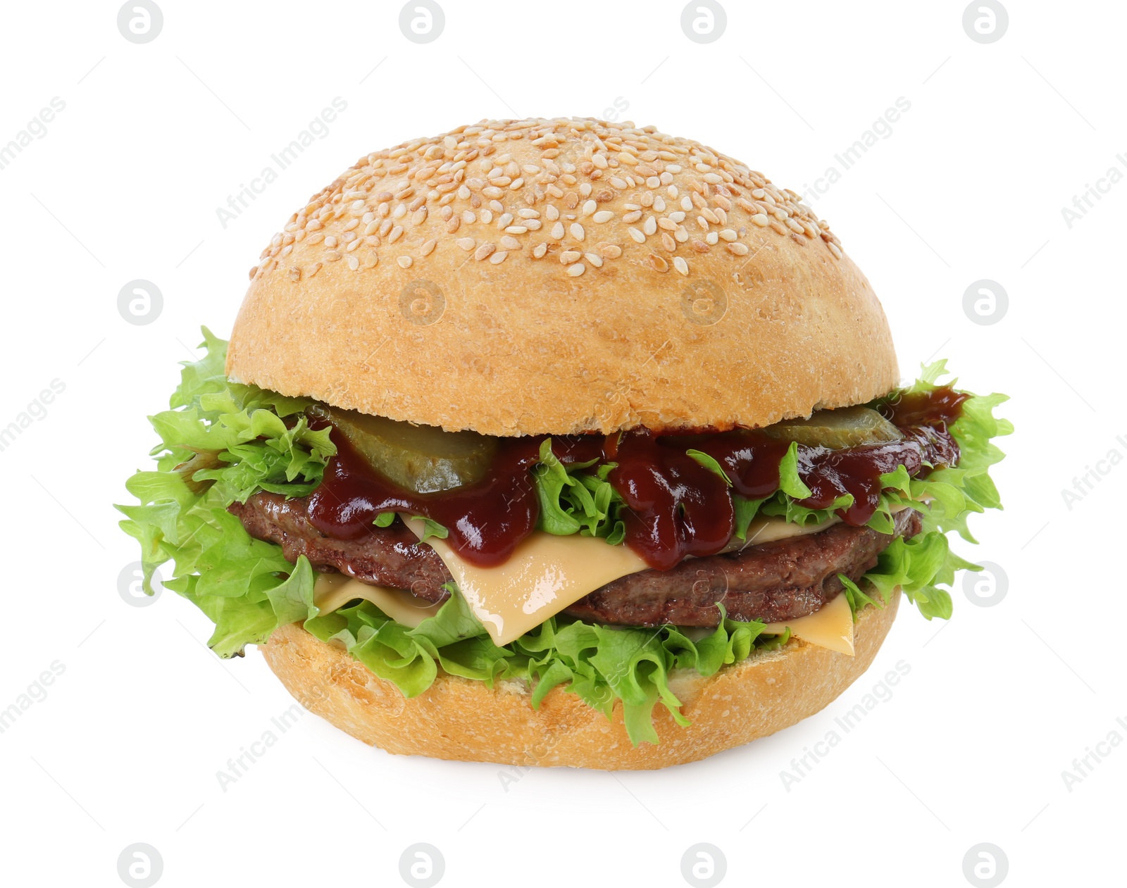 Photo of Delicious cheeseburger with lettuce, pickle, ketchup and patty isolated on white