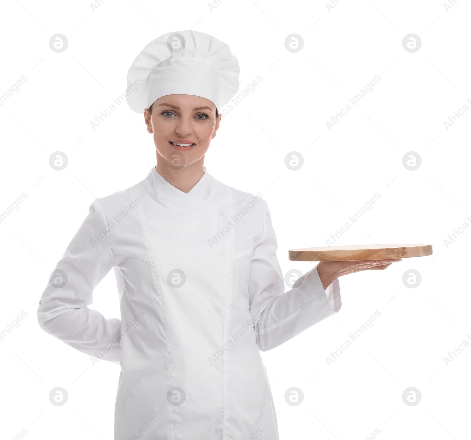 Photo of Happy chef in uniform holding empty wooden board on white background