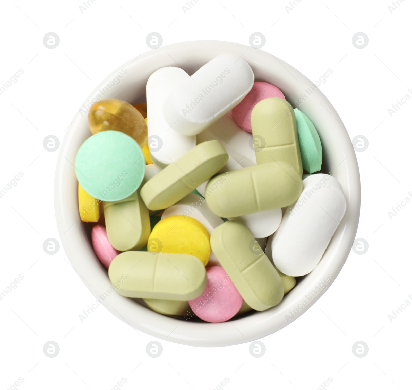 Photo of Different vitamin capsules in bowl isolated on white, top view