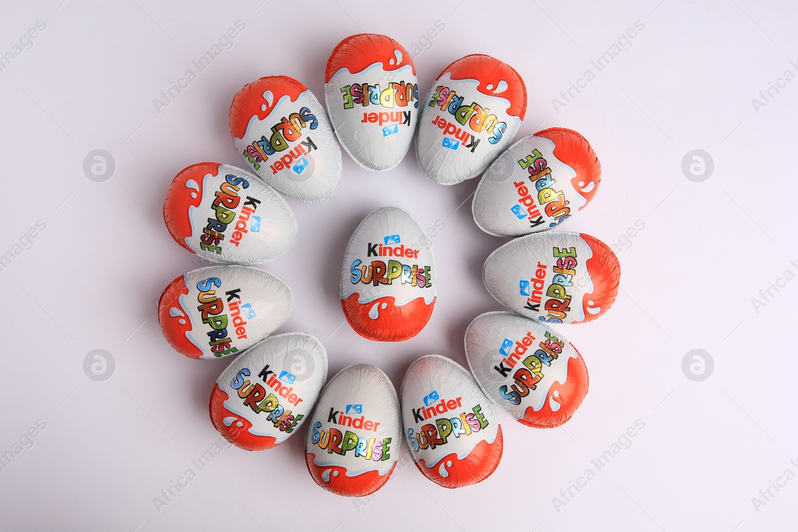 Photo of Sveti Vlas, Bulgaria - June 26, 2023: Kinder Surprise Eggs on white background, flat lay