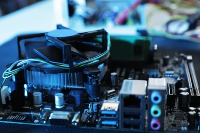 Photo of Motherboard on table, closeup. Computer repair service