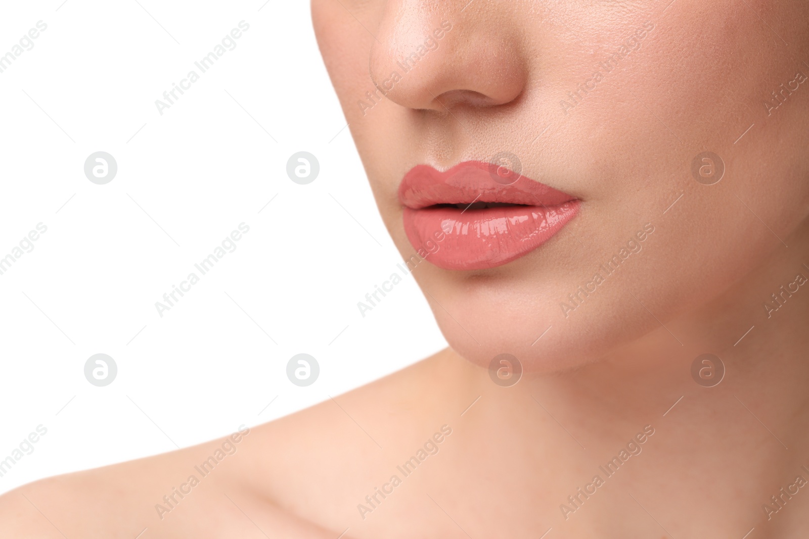 Photo of Woman wearing beautiful lip gloss on white background, closeup