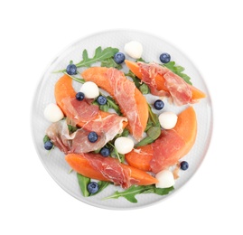 Photo of Fresh melon with prosciutto, mozzarella and arugula on white background, top view