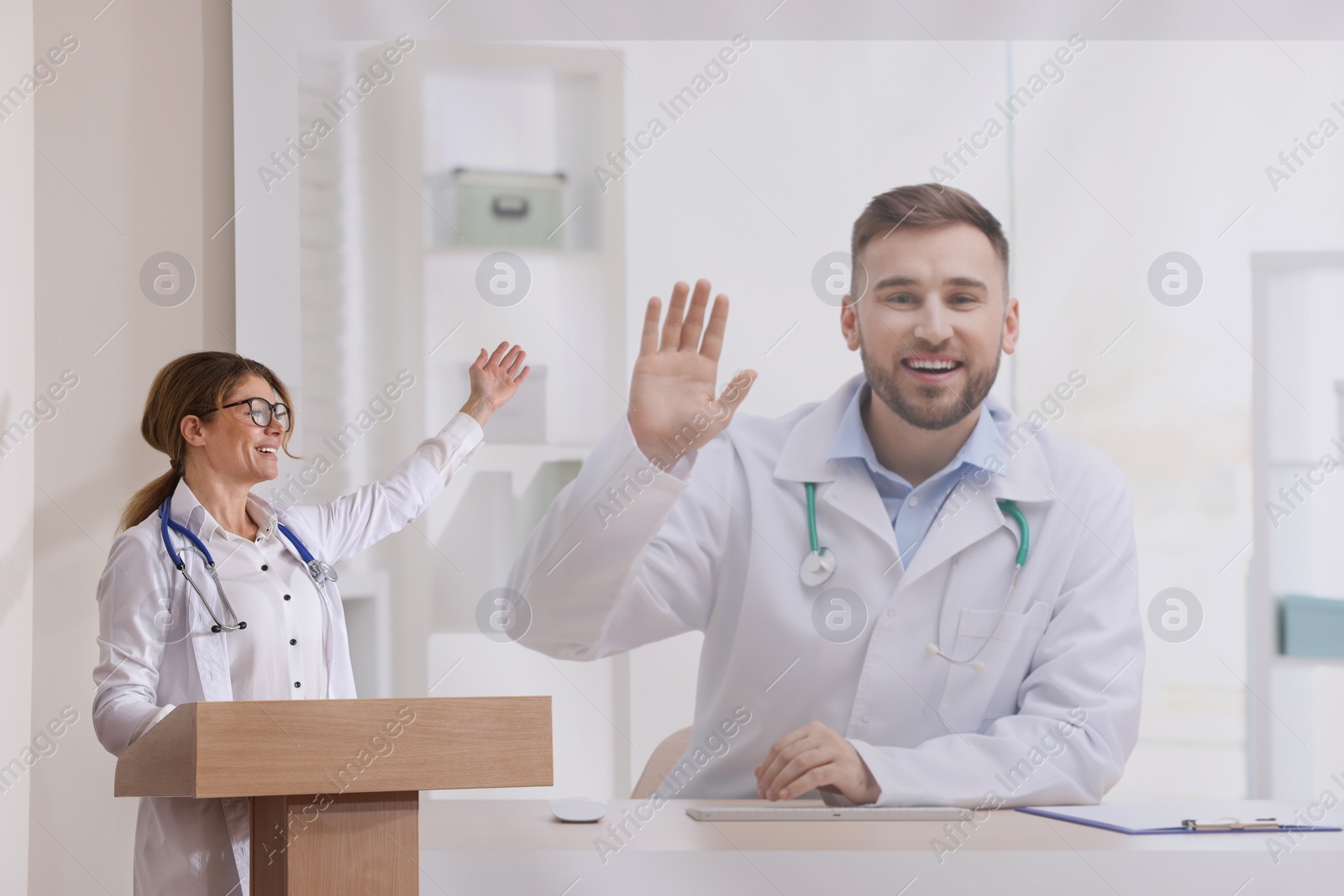 Image of Lecture with online participant. Doctor in meeting room. Using projector for videoconference