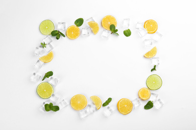 Photo of Frame made with ingredients for lemonade on white background, top view. Space for text
