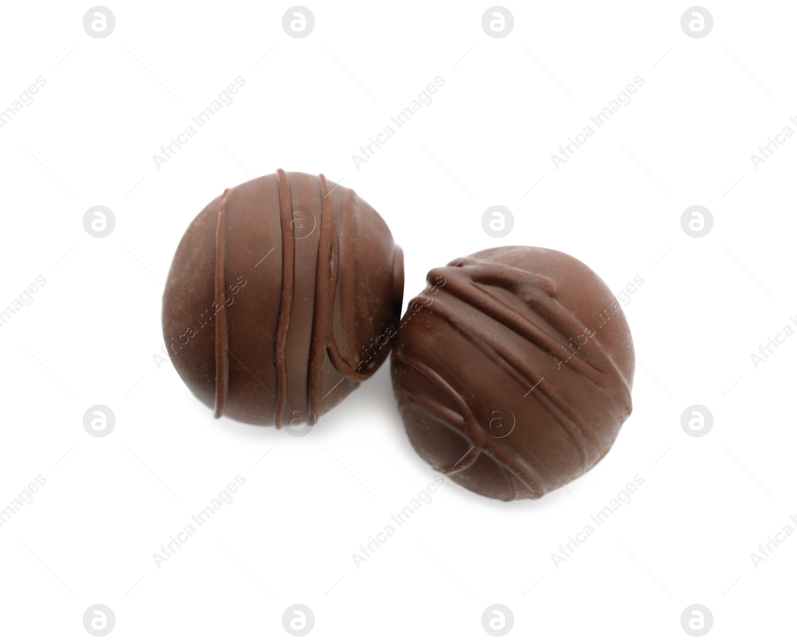 Photo of Delicious sweet chocolate truffles on white background, top view