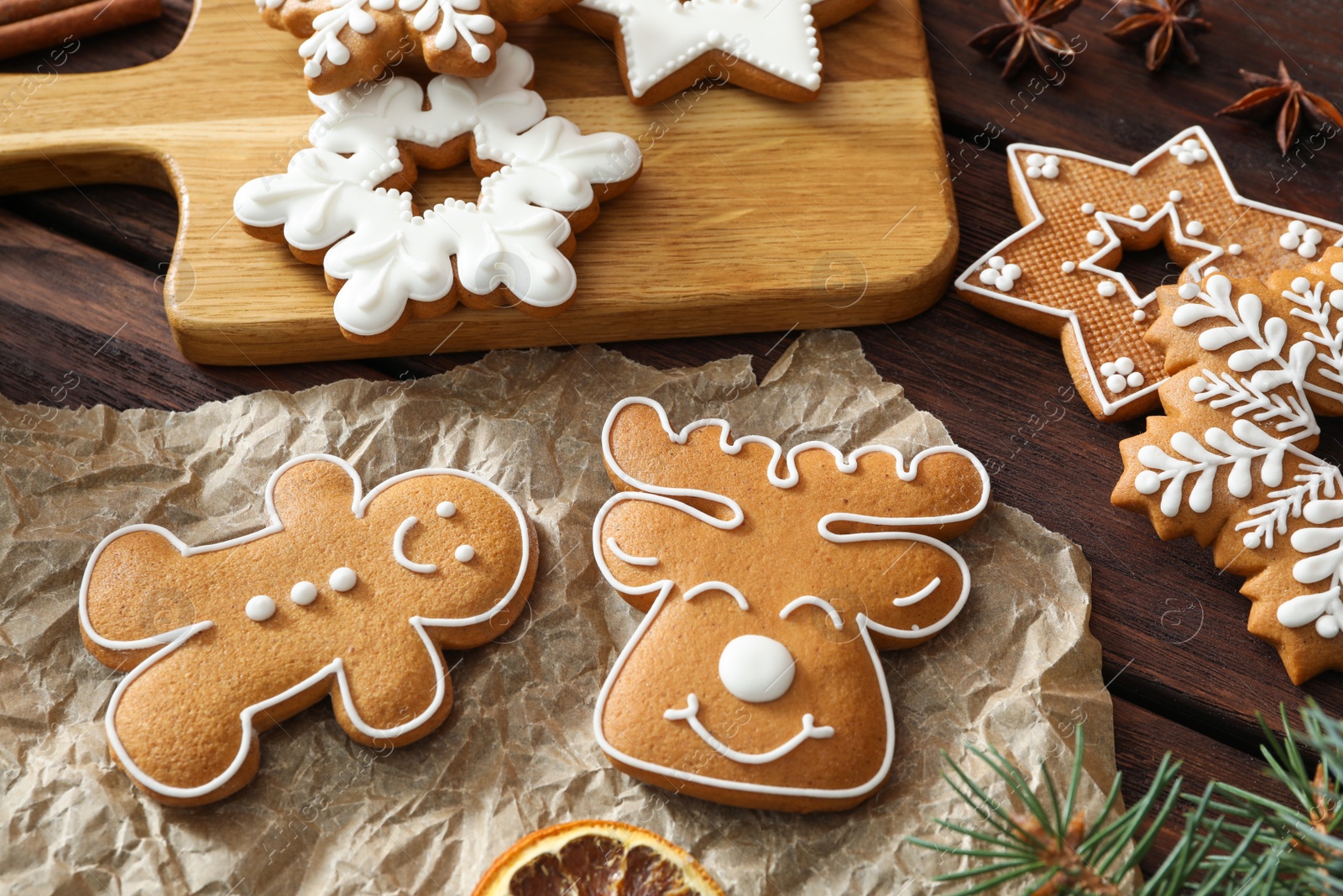 Photo of Delicious homemade Christmas cookies on wooden table