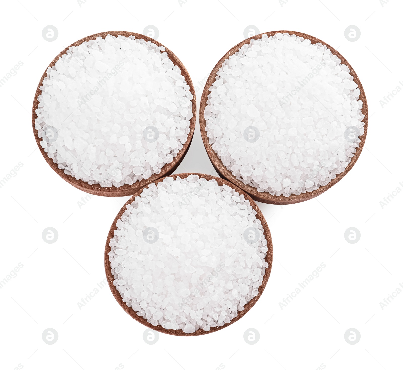 Photo of Wooden bowls with natural sea salt isolated on white, top view