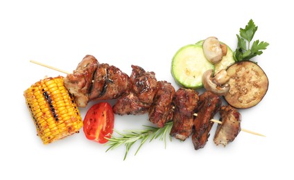 Photo of Delicious shish kebab, parsley, rosemary and vegetables isolated on white, top view