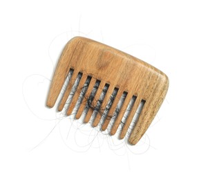 Photo of Wooden comb with lost hair on white background, top view