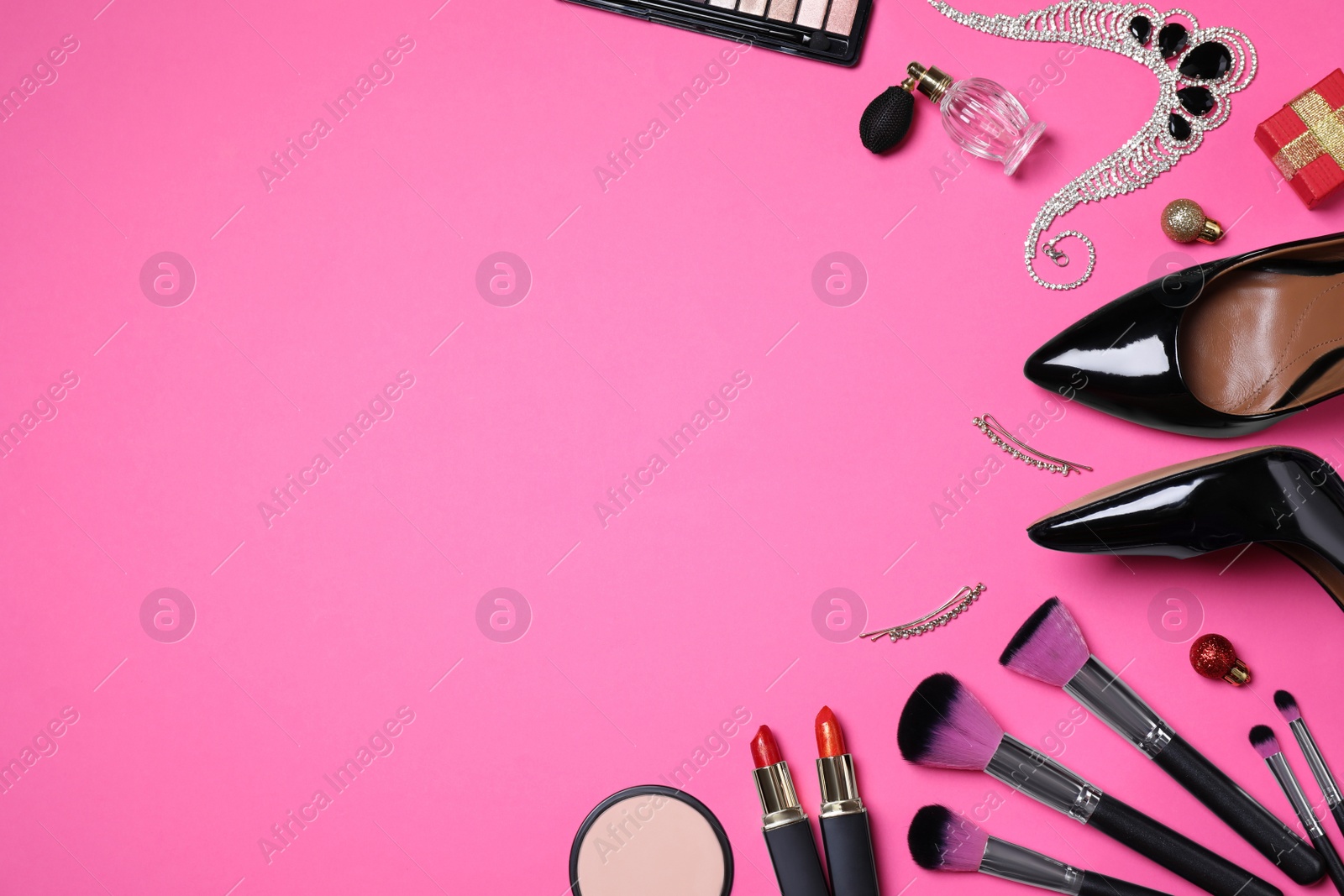 Photo of Flat lay composition with cosmetic products and accessories on pink background