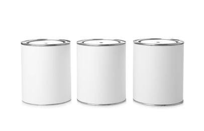 Photo of Paint cans on white background. Mockup for design