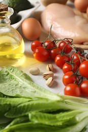 Many different healthy food on white table, closeup