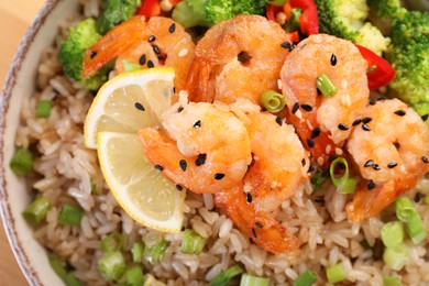 Photo of Tasty rice with shrimps and vegetables, top view