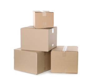 Photo of Pile of cardboard boxes on white background