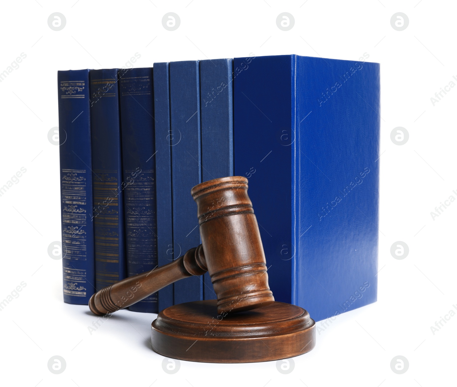 Photo of Wooden gavel and books on white background. Law concept