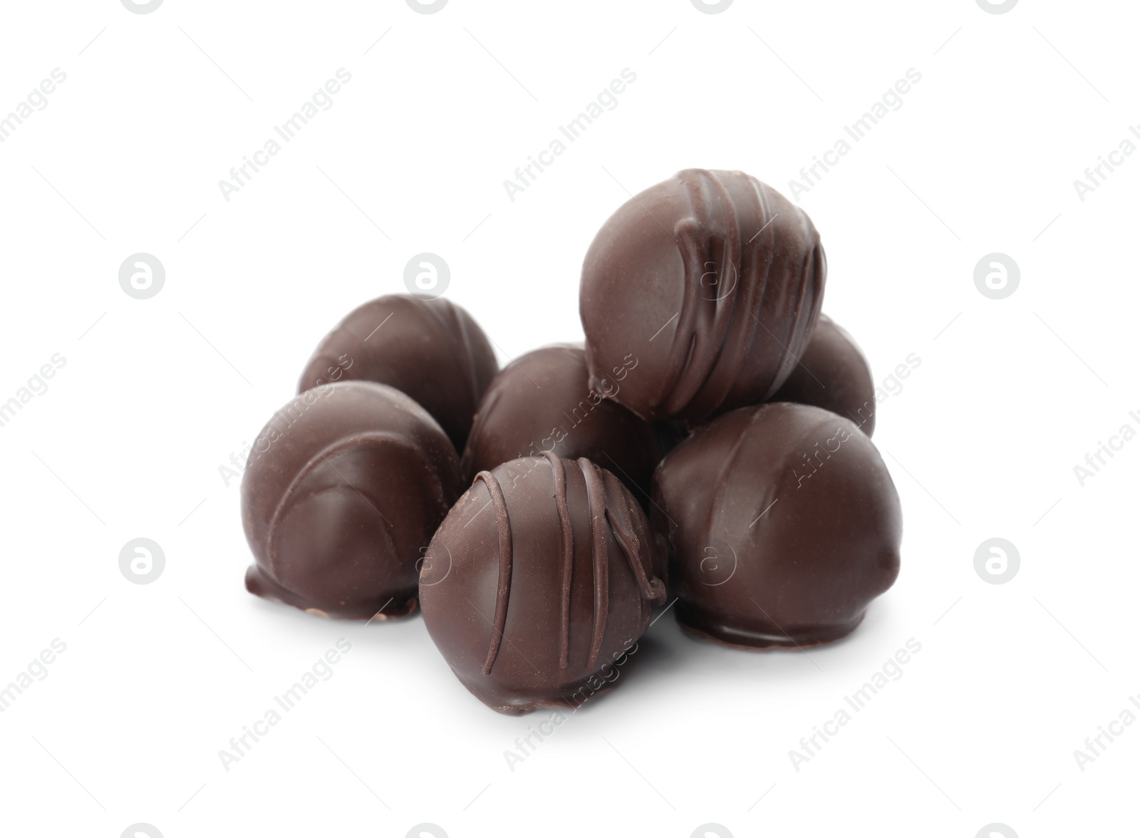 Photo of Many delicious sweet chocolate truffles on white background