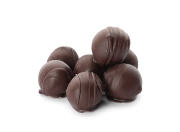 Photo of Many delicious sweet chocolate truffles on white background