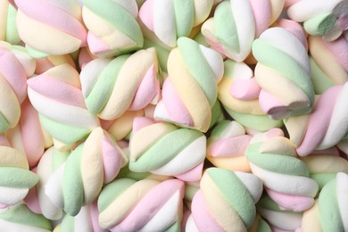 Photo of Delicious colorful marshmallows as background, top view