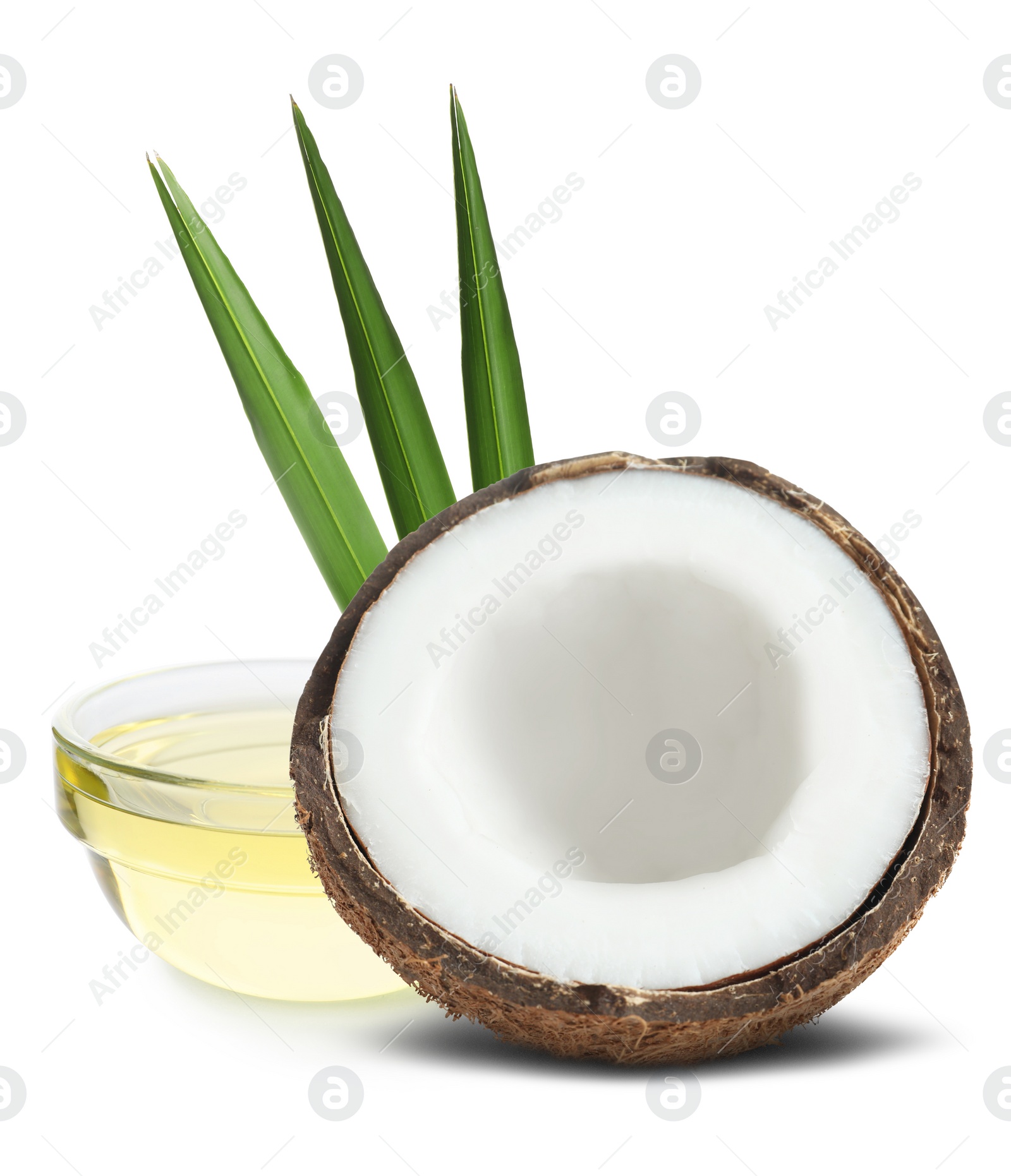 Image of Bowl of coconut cooking oil and fruit on white background