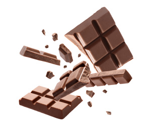 Image of Milk chocolate pieces falling on white background