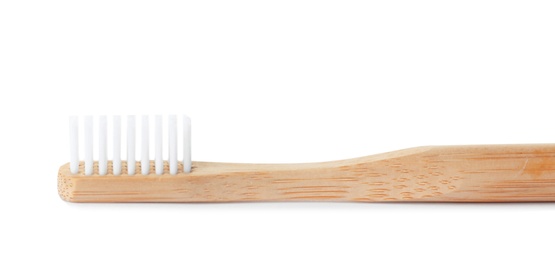 Bamboo toothbrush on white background. Dental care