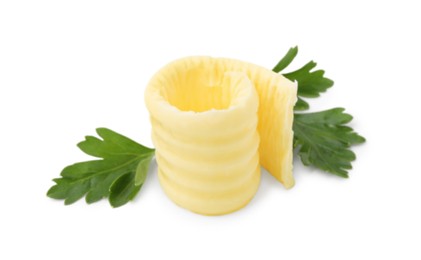 Photo of Tasty butter curl and fresh parsley isolated on white