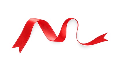 Photo of Simple red ribbon on white background, top view