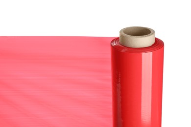 Photo of Roll of red plastic stretch wrap film isolated on white